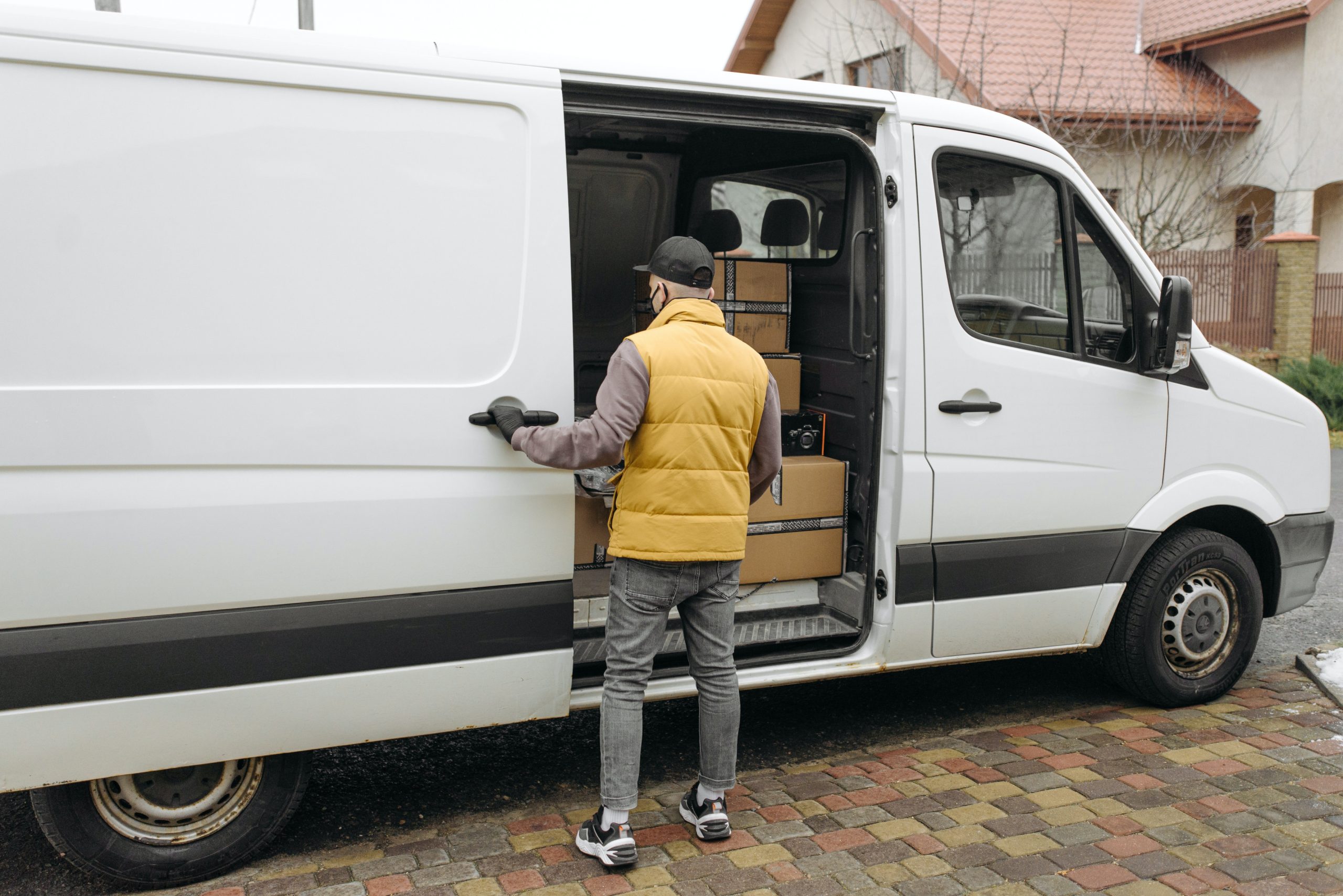 Instant Asset Write Off Scheme - white delivery van with driver