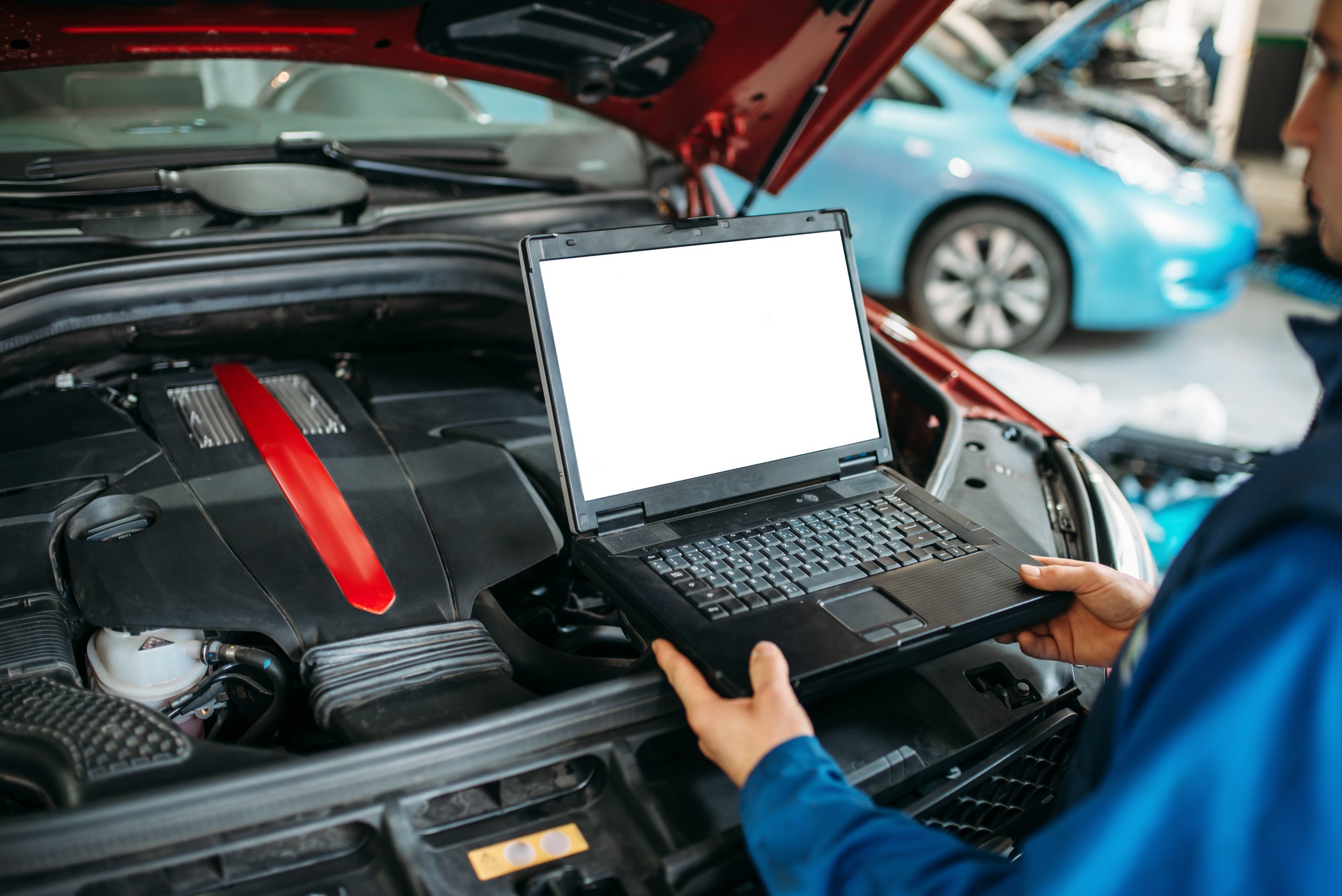 ECU Remapping - mechanic working on car