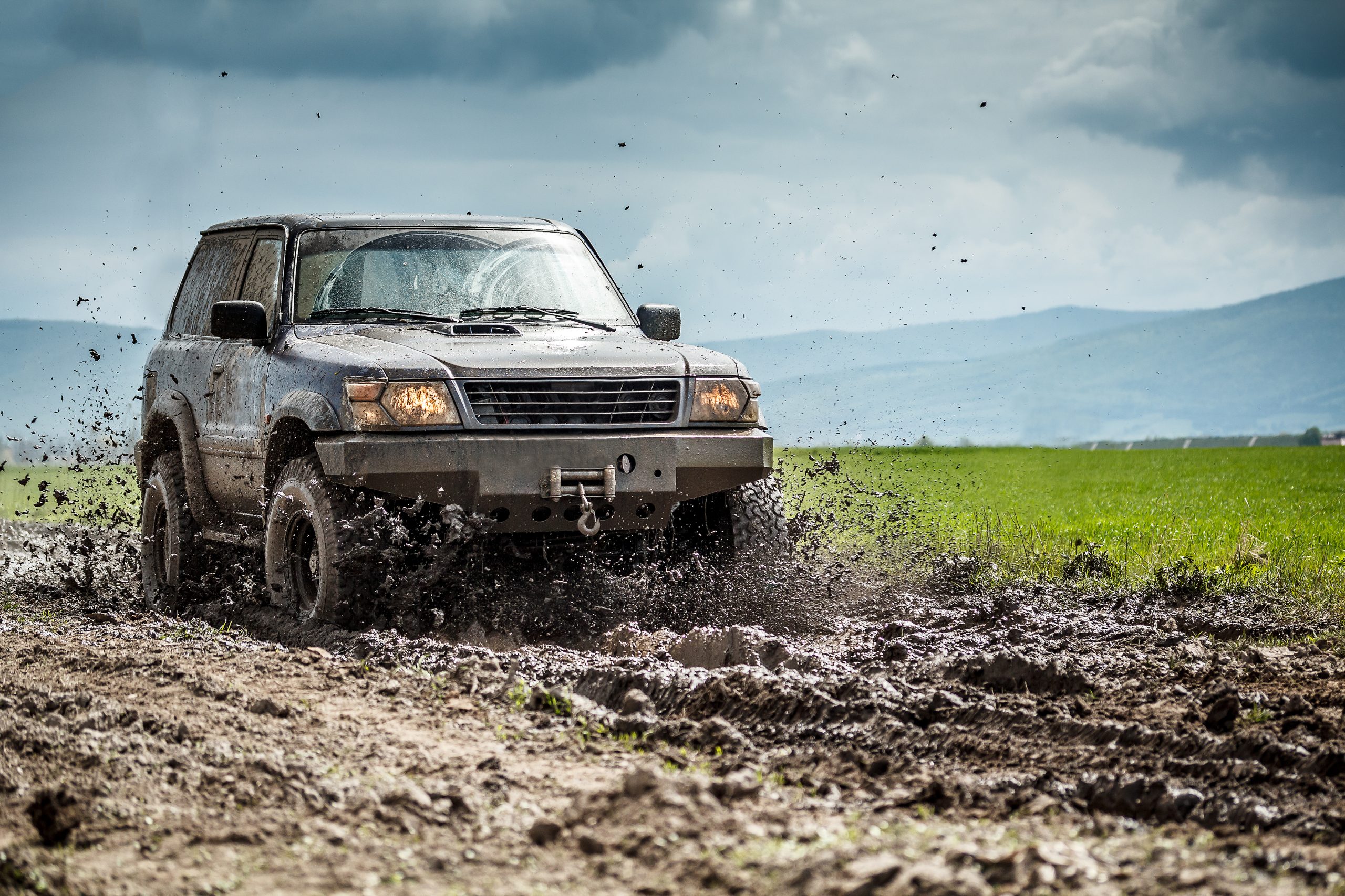 5 Ways to Boost Diesel Engine Performance  - car sliding through mud