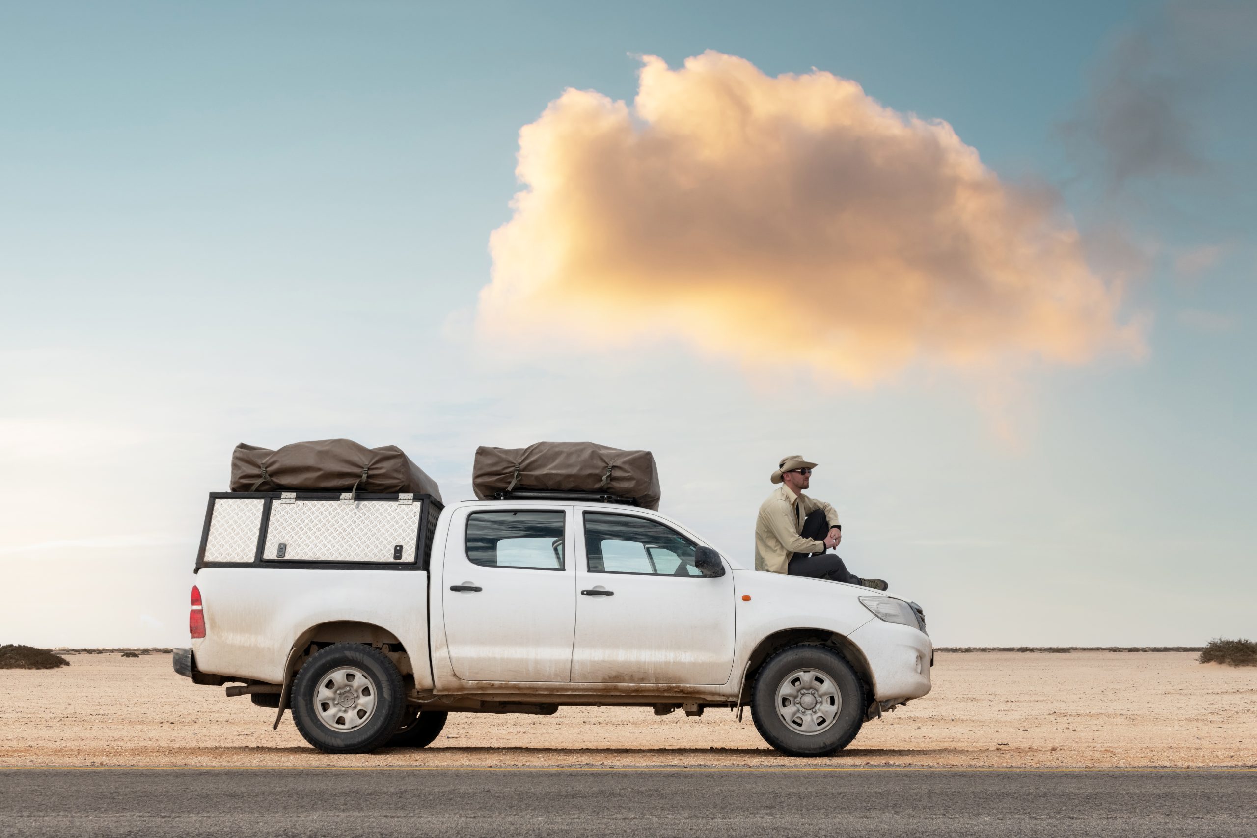 Top Aftermarket Horsepower Modifications for Diesel Engines - white UTE with driver sitting on hood