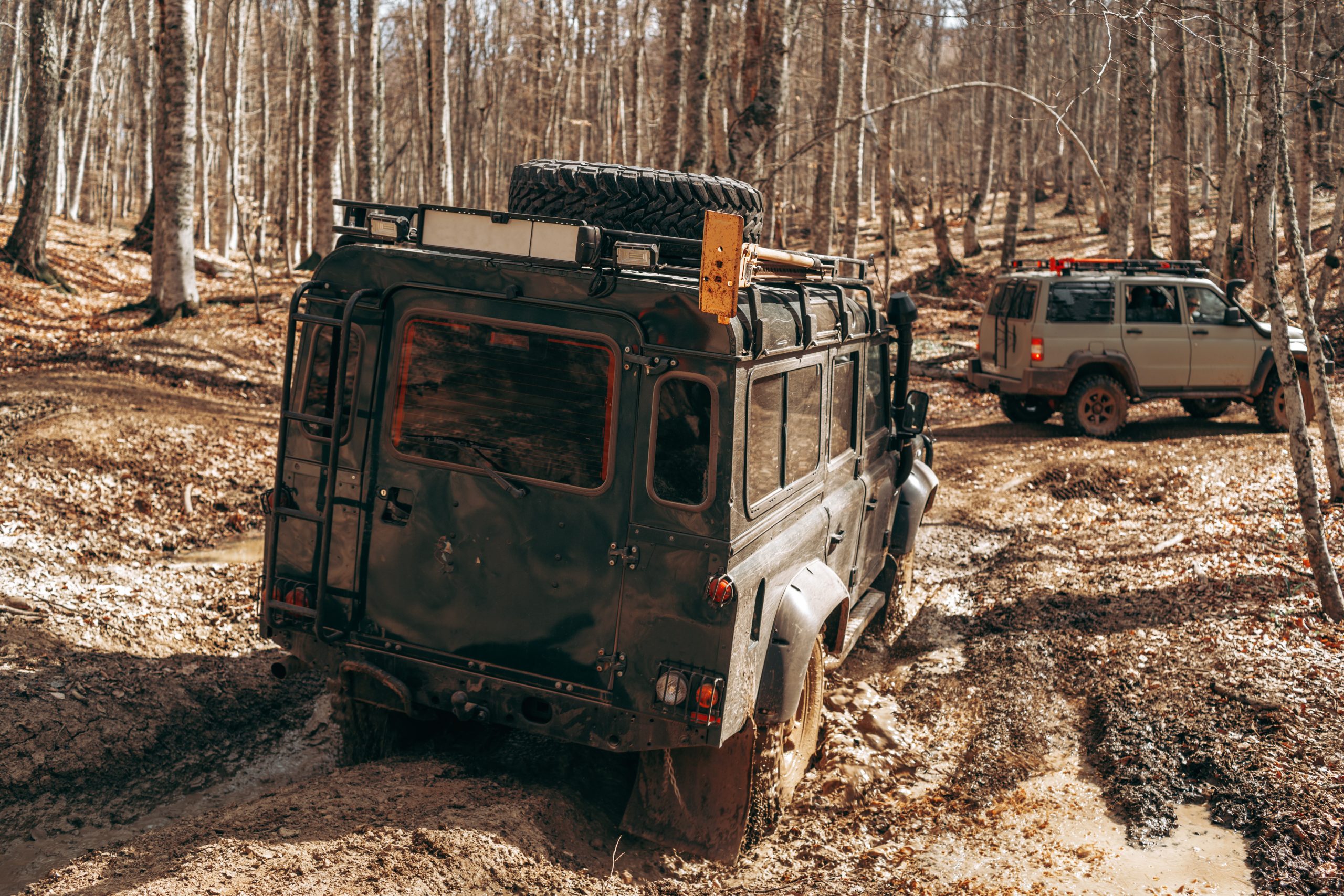 What is a Diesel Engine Tune Up? - rear of an SUV diesel car driving through mud