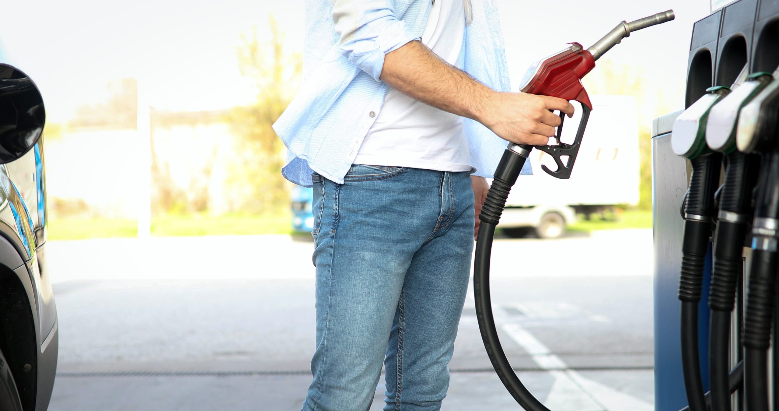 Maximise Your Mileage: Diesel Fuel Economy Tips - man filling up at service station