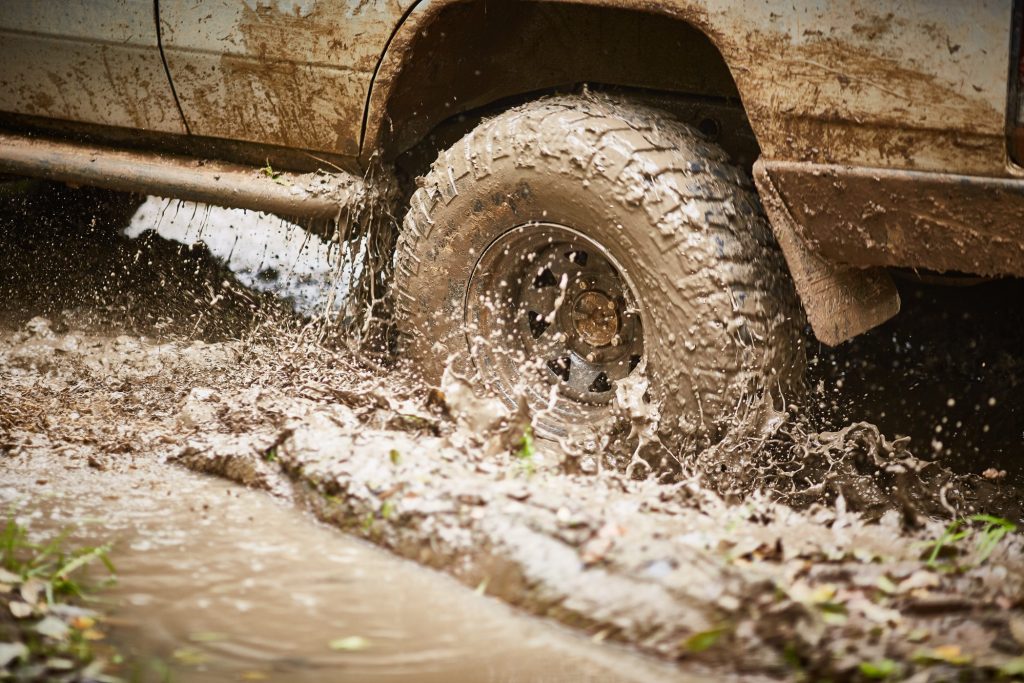 Off-Road Driving Maintenance Tips for Diesel Engines - close up of muddy tyre