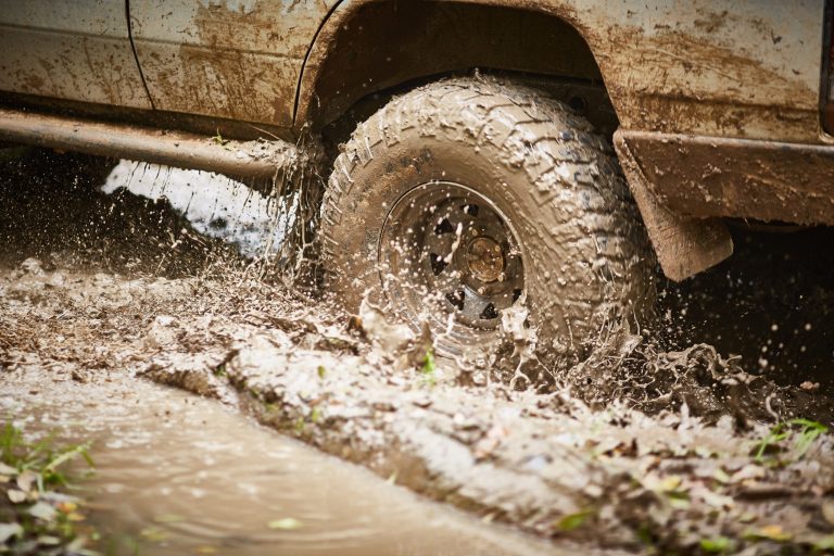 Off-Road Driving Maintenance Tips for Diesel Engines - close up of muddy tyre