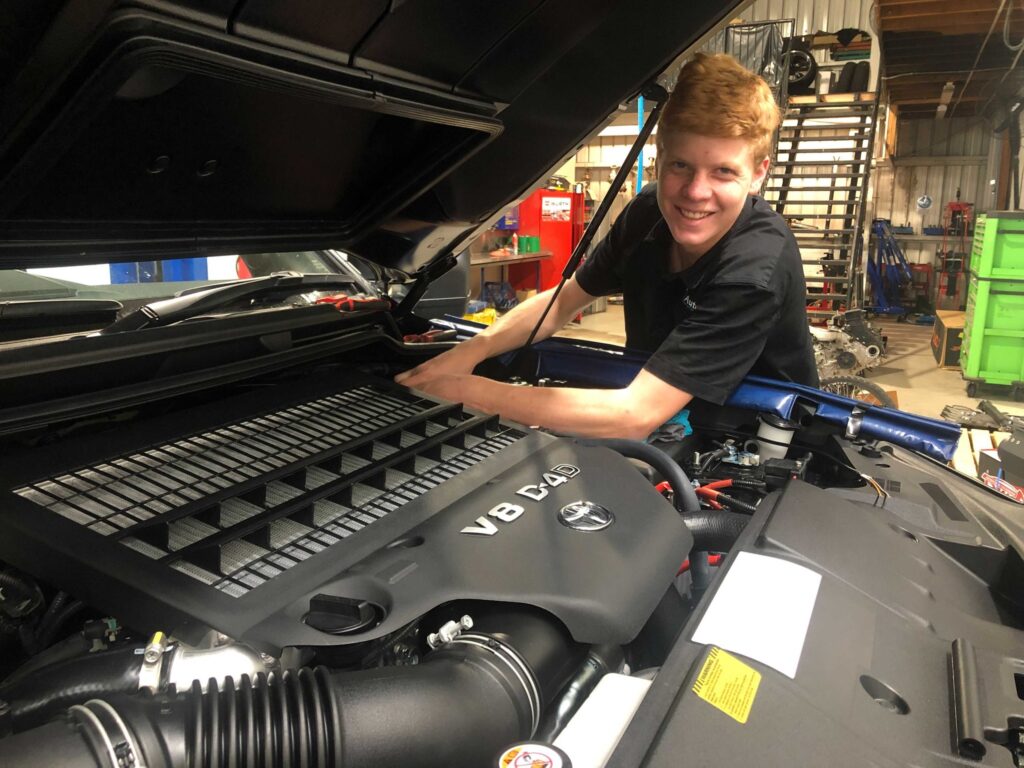 3 Reasons to Remap Your Land Cruiser's ECU - apprentice at Just Autos working on Toyota