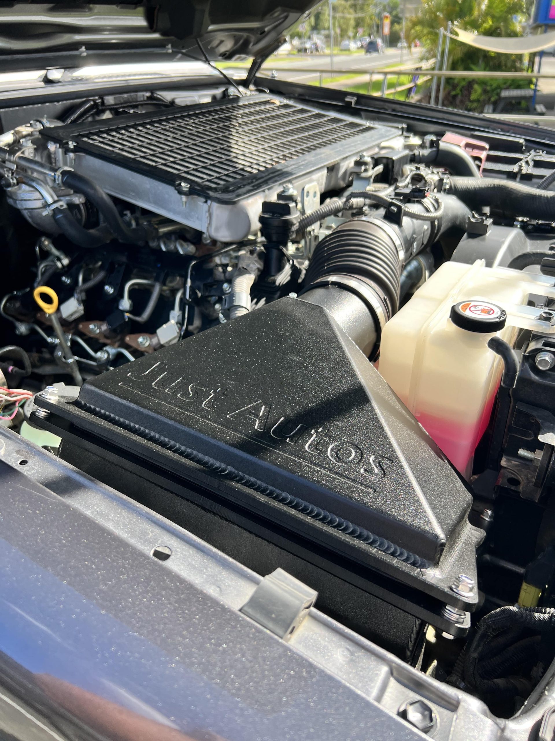 Advantages of Aftermarket Airboxes for Toyota Diesels - Just Autos diesel performance airbox fitted onto Toyota diesel engine