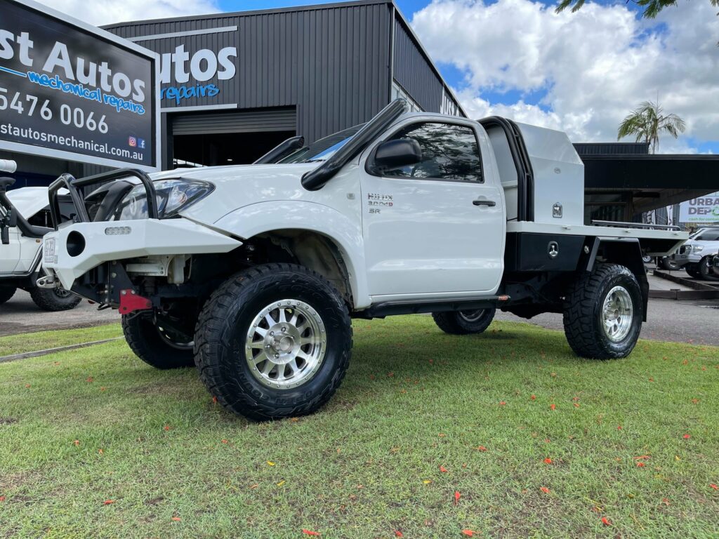 Safe vs Risky Diesel Performance Upgrades - Toyota Hilux parked outside Just Autos