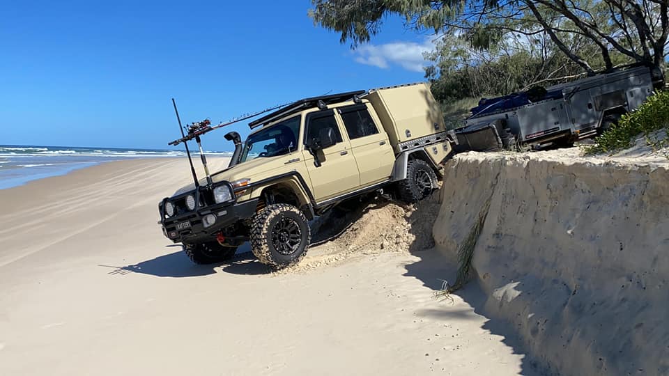 Petrol vs Diesel: Buying Your Next 4WD Toyota - Toyota Land Cruiser driving on beach