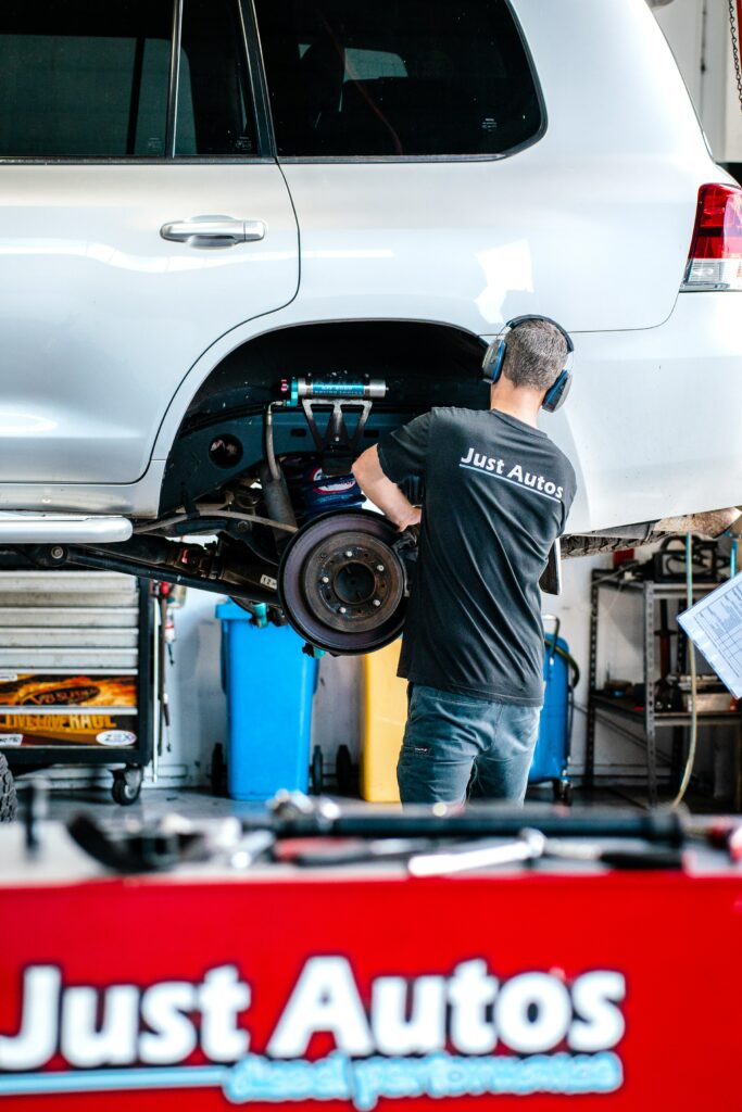 Diesel performance mechanic at Just Autos working on Toyota 200 Series Land Cruiser