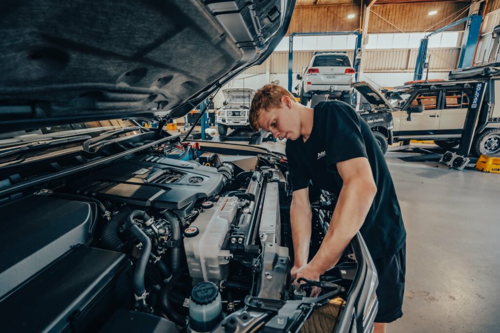 Just Autos diesel performance technician working on Toyota diesel