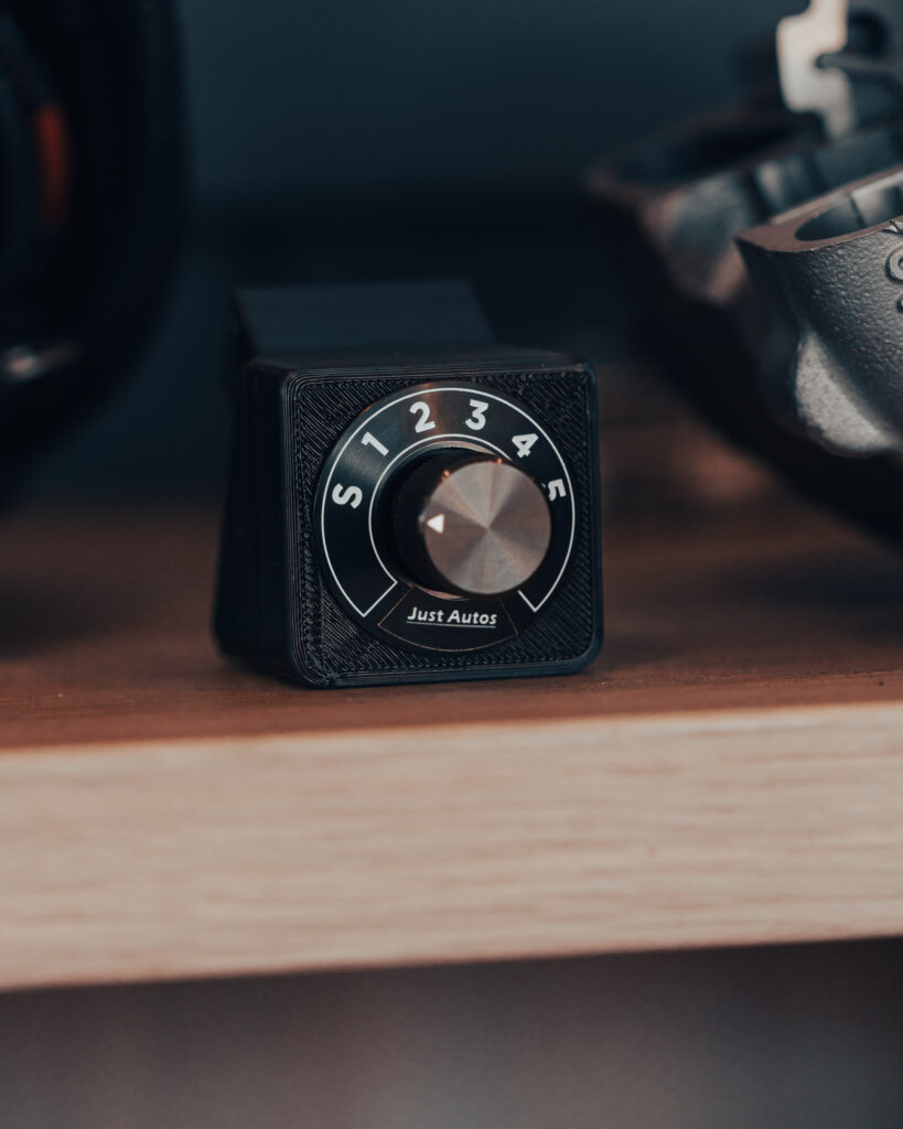 Toyota 200 Series hood badge detail close-up
